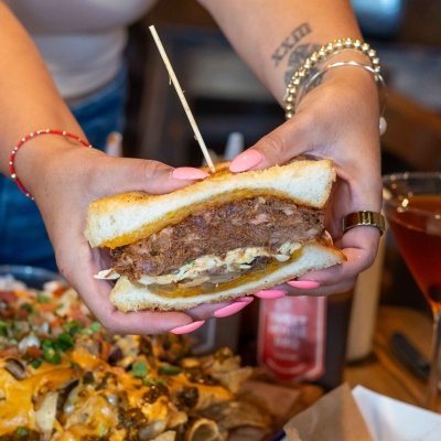 woman-holding-sandwich-border-bar.jpg